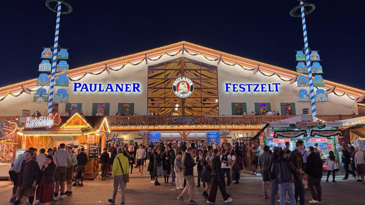 The Paulaner Festzelt, lit up at night.